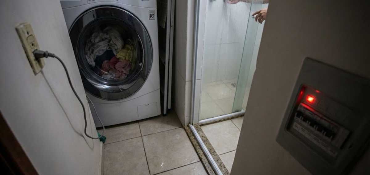 shower with the washing machine on