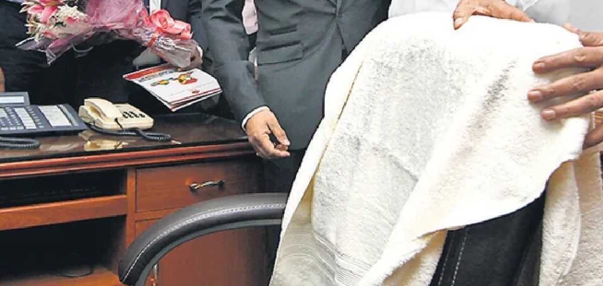 white colour towel chair in government offices