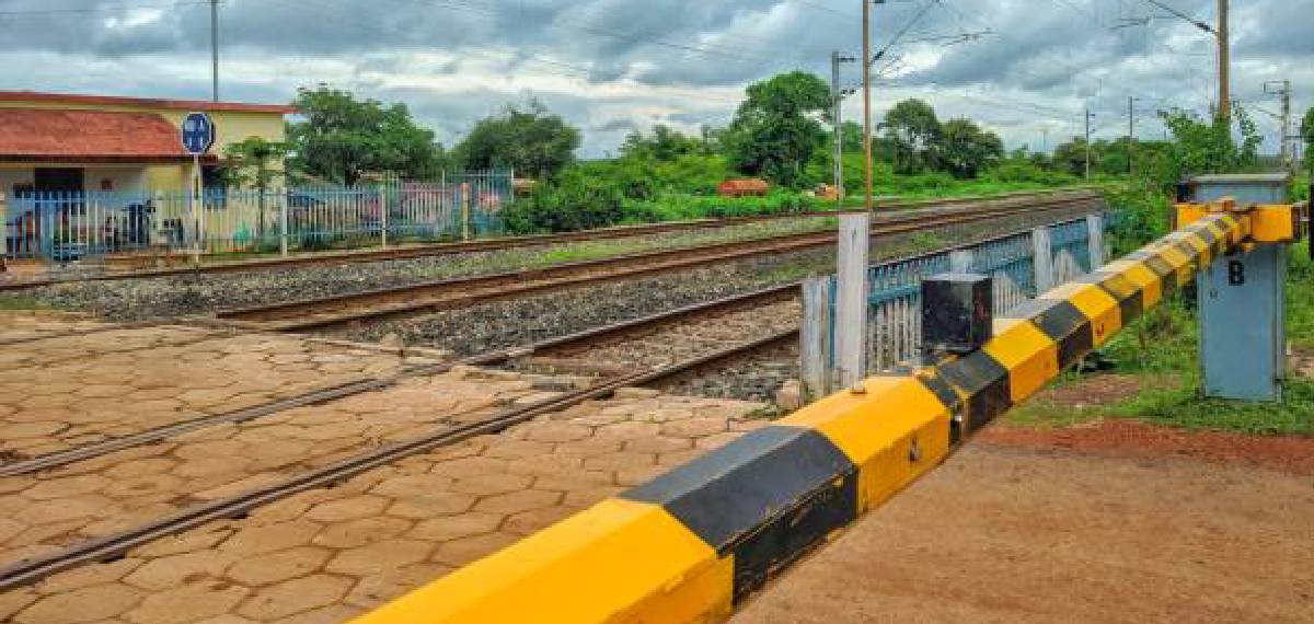 Railway gates open a minute after a train passes