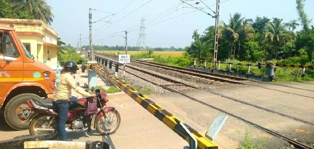 Railway gates open a minute after a train passes
