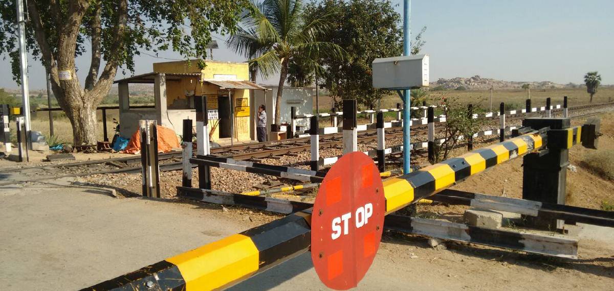 Railway gates open a minute after a train passes