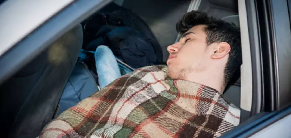 sleeping in a car parked by the roadside