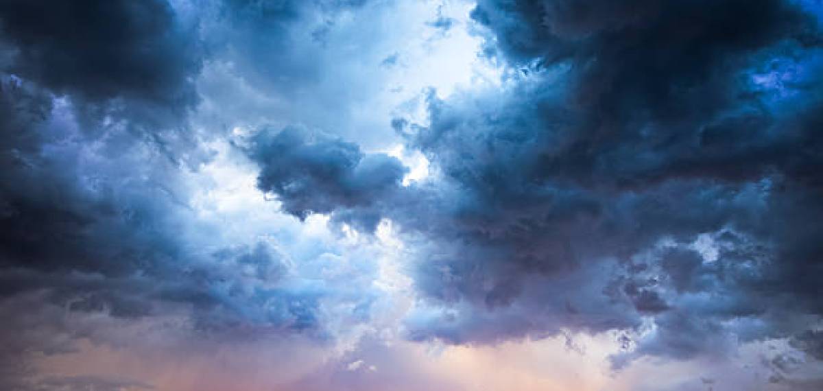 Why do rain clouds appear black