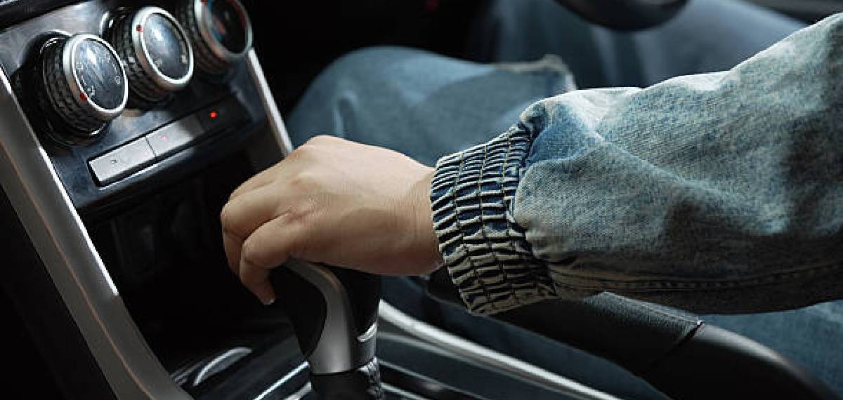 accidentally shift into reverse gear while the car is moving