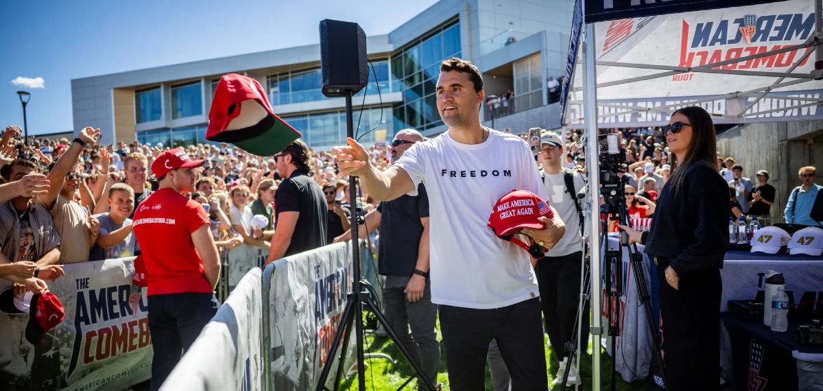 Charlie Kirk giving away Make America Great Again hats at Utah Valley University in Orem