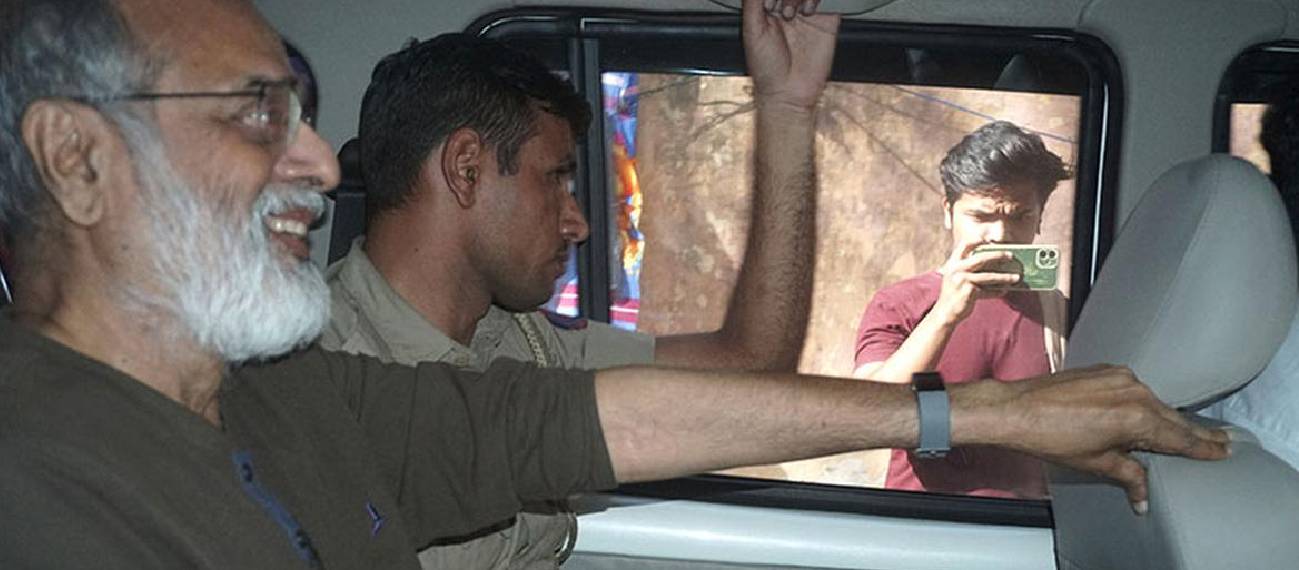 Founder and Editor-in-Chief of NewsClick Prabir Purkayastha is brought to Delhi Police Special Cell in New Delhi on October 3, 2023