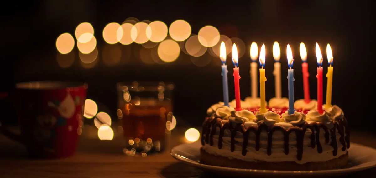 blow out the candles cutting a birthday cake