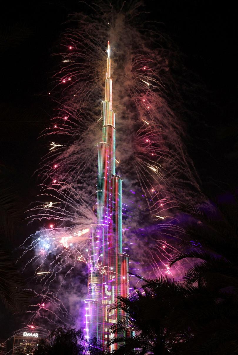 The Burj Khalifa illuminates with fireworks during New Year's celebrations in Dubai, United Arab Emirates, on January 1, 2026.